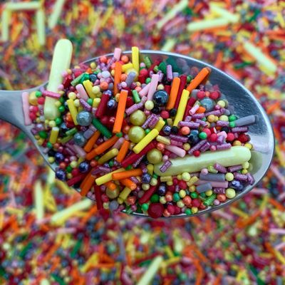 A spoonful of colourful mixed sprinkles